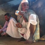 Grandfather sipped his chai, the smoke from the woodstove transformed by the sunlight into a grey slanted column behind him. His daughter-in-law Seema slapped the bhakri bread into rounds and singed them on the griddle over the fire. Yes, she said, of coursse she would prefer a gas stove. But Grandfather, teacup in hand, balked. Seema demured. It was true. Her husband liked the way bhakri tasted cooked over the wood Seema collected free from the fields, which she lit in the small kitchen with the blackened walls.